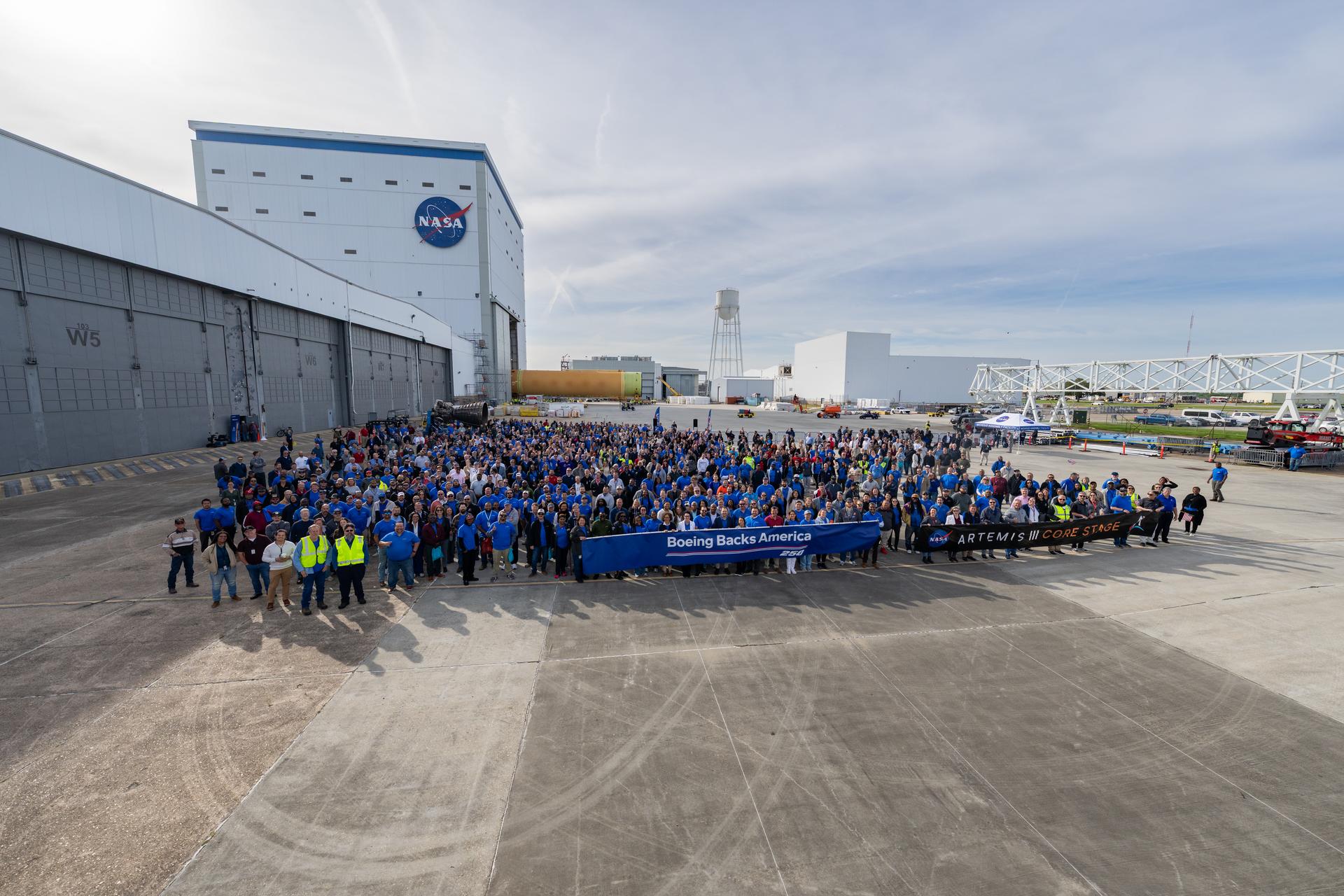 NASA moved the core stage, or the largest section, of the SLS (Space Launch System) rocket that will launch the crewed Artemis III mission in 2027 from the agency’s Michoud Assembly Facility to the agency’s Pegasus barge in New Orleans on April 20. The barge will ferry the top four-fifths – the section containing the liquid hydrogen tank, liquid oxygen tank, intertank, and forward skirt – of the SLS core stage to NASA’s Kennedy Space Center in Florida to complete outfitting and vertical integration.  Teams with NASA and Boeing, the SLS core stage lead contractor, used specialized transporters to guide the top four-fifths from the NASA rocket factory to Pegasus. Prior to the move, technicians added an engine section transportation simulator to the rocket stage for shipment to the Space Coast.  Next year’s Artemis III mission will launch astronauts to Earth’s orbit aboard the Orion spacecraft on top of SLS to test rendezvous and docking capabilities between Orion and commercial spacecraft needed to land Artemis IV astronauts on the Moon in 2028. NASA’s SLS is the only rocket capable of sending Orion, astronauts, and supplies to the Moon in a single launch.